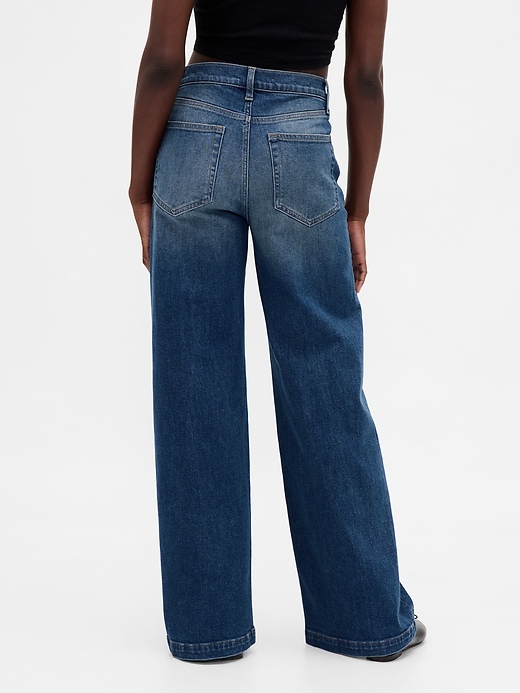 jeans a gamba larga con vita a v e vita alta stride