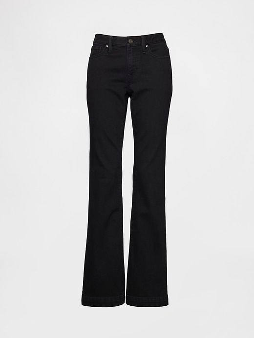 jeans lunghi e attillati a vita bassa e sinuosa