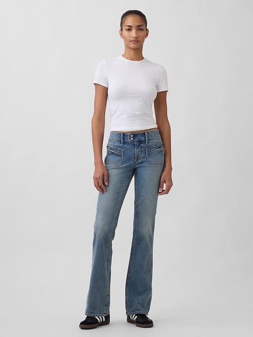 jeans lunghi e attillati a vita bassa