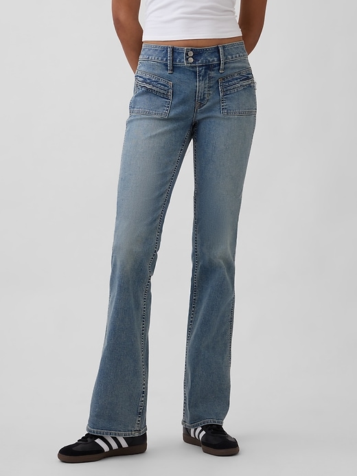 jeans lunghi e attillati a vita bassa