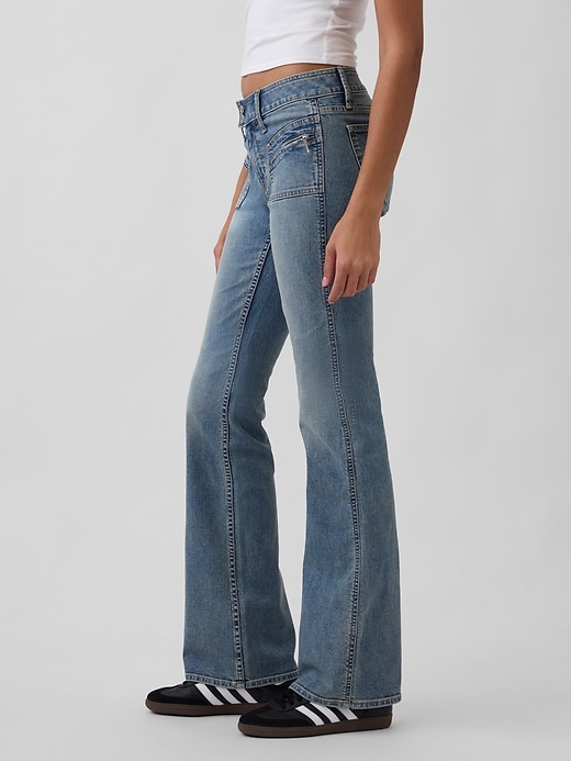 jeans lunghi e attillati a vita bassa