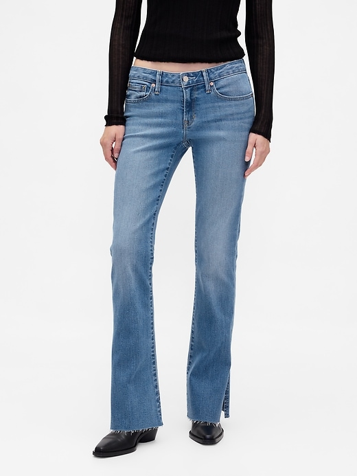 jeans a vita bassa lunghi e attillati con orlo diviso