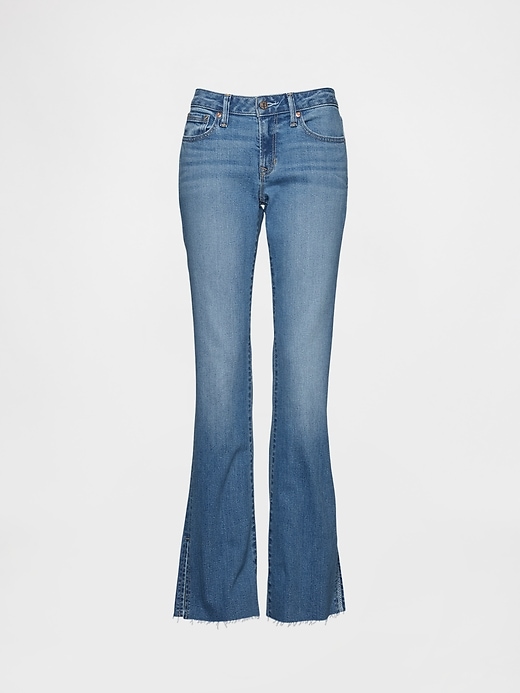 jeans a vita bassa lunghi e attillati con orlo diviso