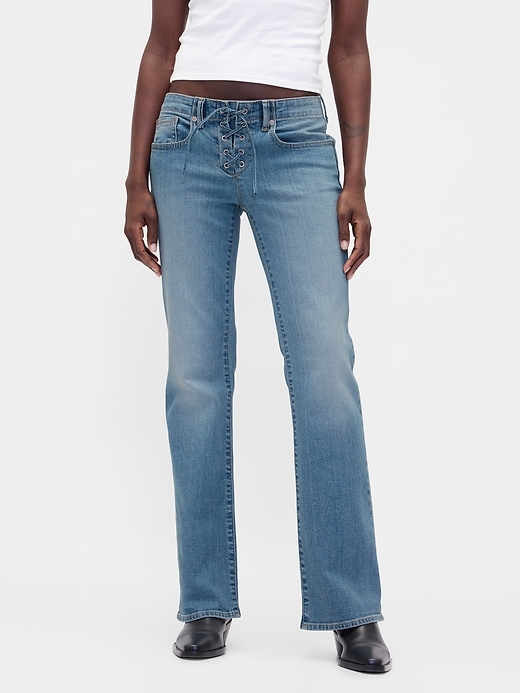 jeans lunghi e attillati con lacci a vita bassa