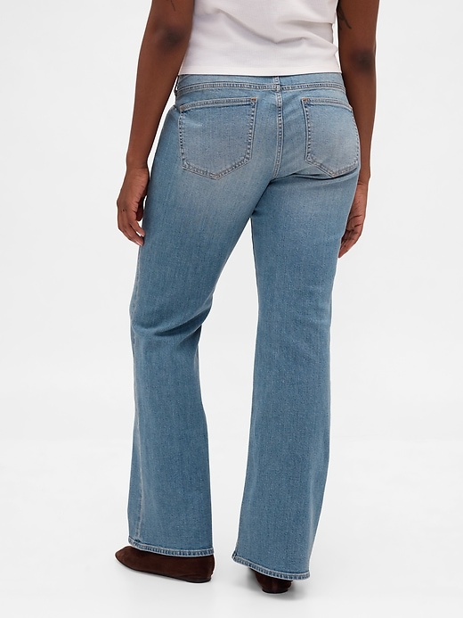 jeans lunghi e attillati con lacci a vita bassa