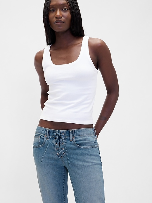 jeans lunghi e attillati con lacci a vita bassa