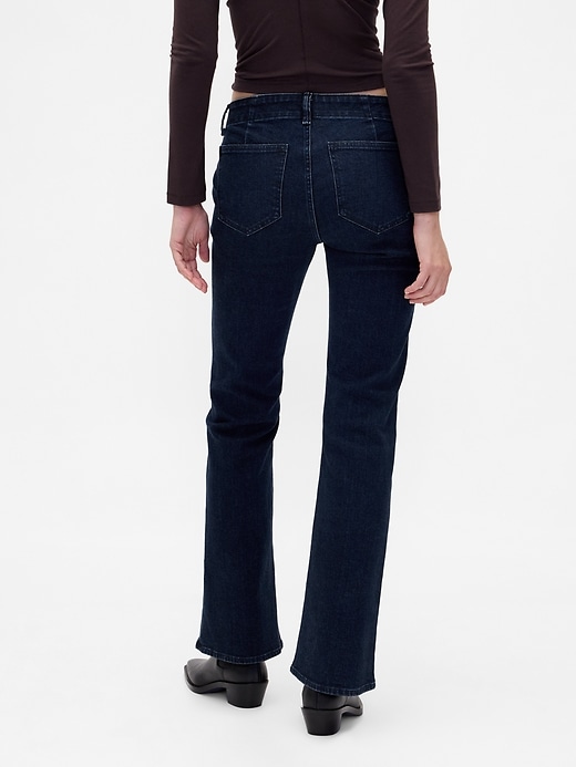 jeans lunghi e attillati a vita bassa