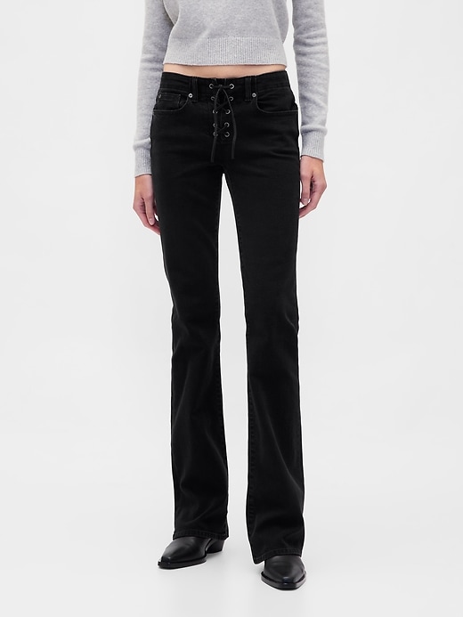 jeans lunghi e aderenti con lacci a vita bassa