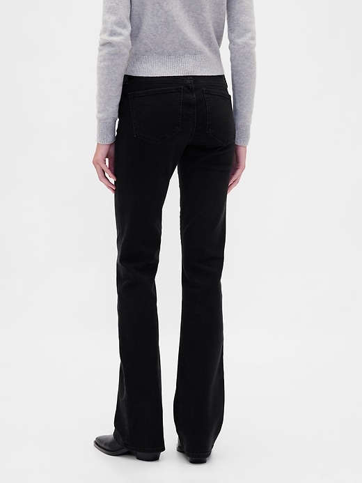 jeans lunghi e aderenti con lacci a vita bassa