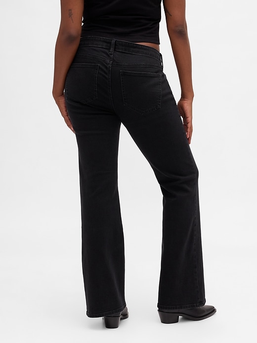 jeans lunghi e aderenti con lacci a vita bassa