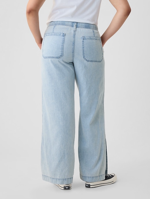 pantaloni a gamba larga in denim