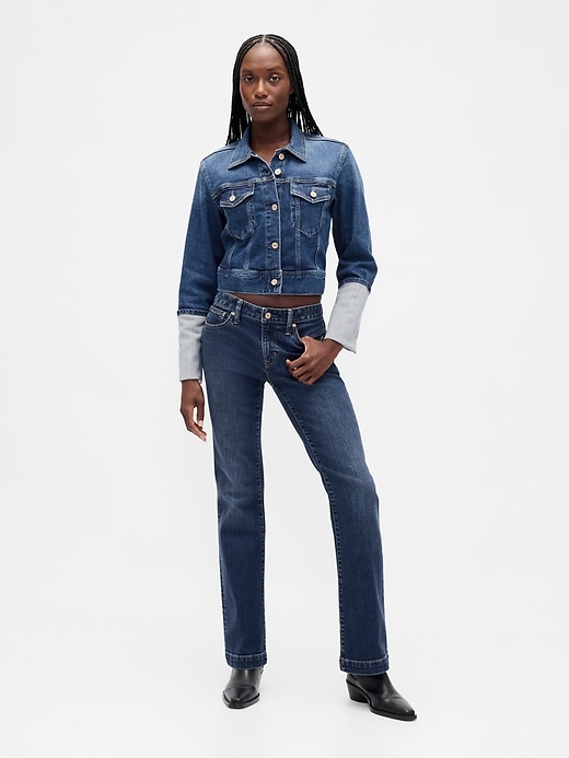 giacca in denim con polsini a spillo e icona corta