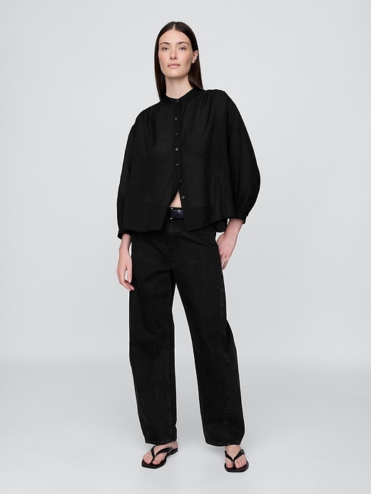 camicia trasparente con bottoni sul davanti