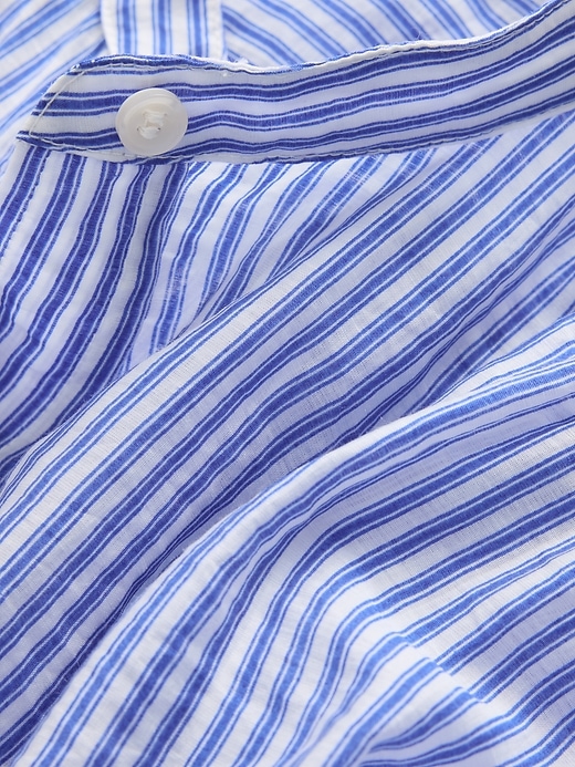 camicia trasparente con bottoni sul davanti