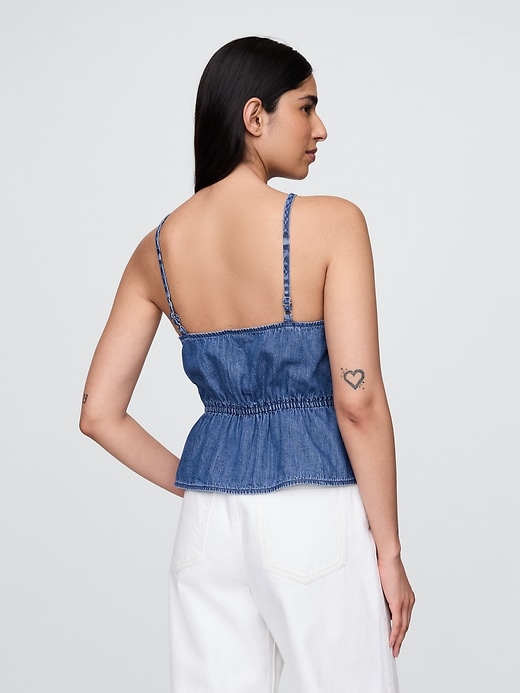 canotta con peplo in denim