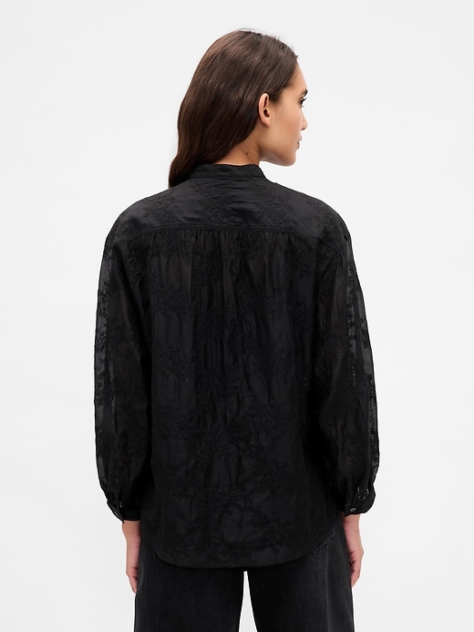 camicia floreale in voile trasparente