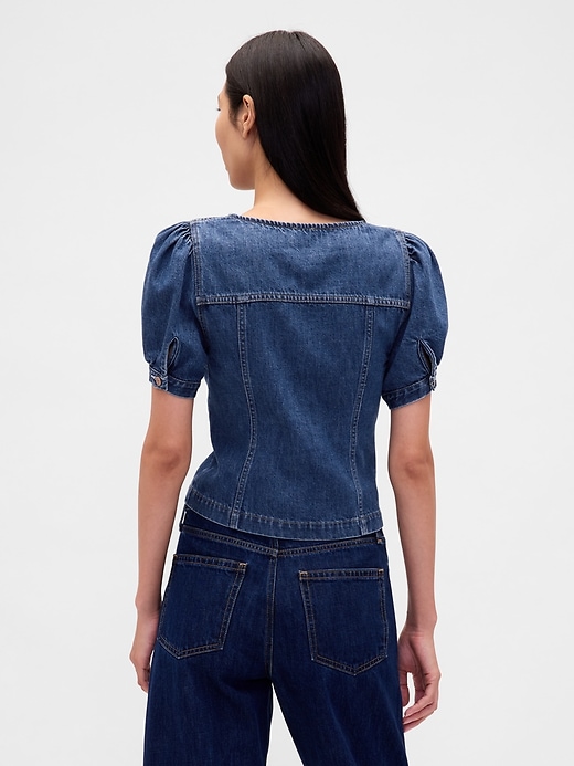 top in denim con maniche a sbuffo e cuciture