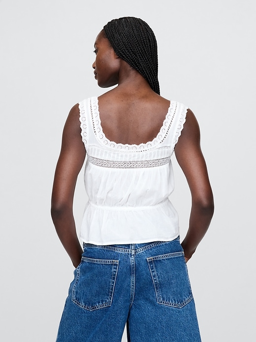 top peplo con pizzo