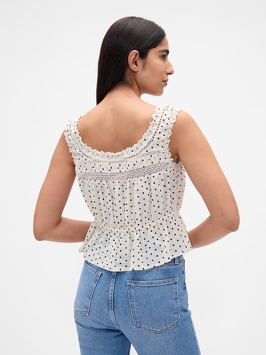 top peplo con pizzo