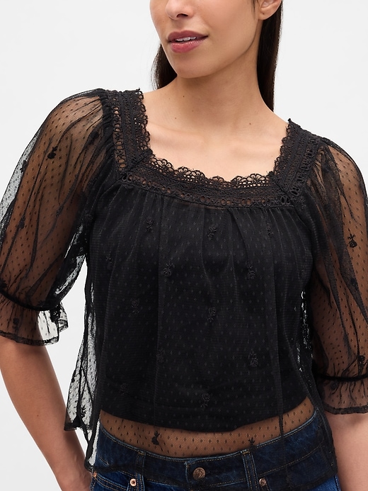 top ricamato in tulle trasparente