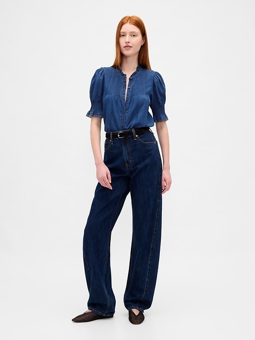 camicia con volant e pieghe