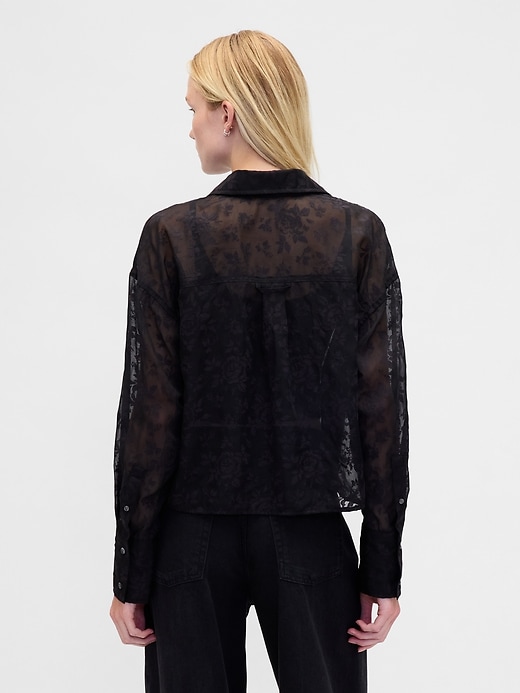 camicia corta trasparente con orlo dritto