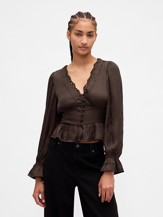top peplo con scollo a v e occhielli