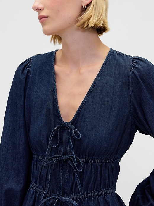camicia corta in denim con nodo sul davanti