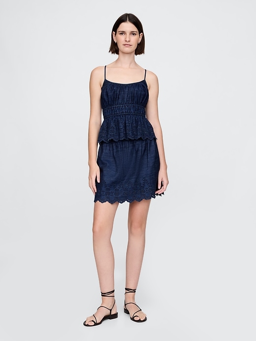 minigonna in denim con occhielli