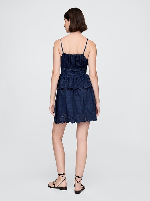 minigonna in denim con occhielli