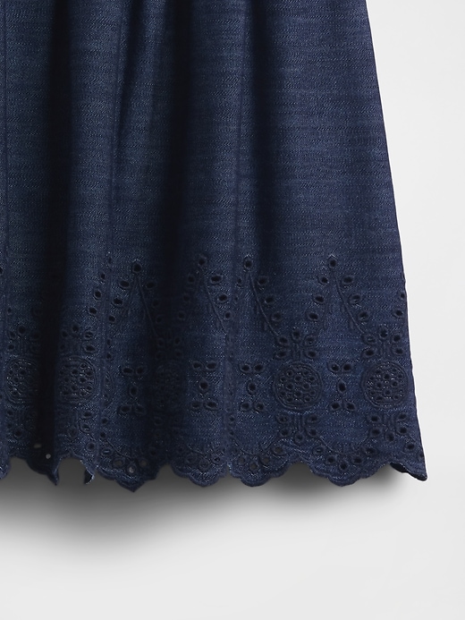 minigonna in denim con occhielli