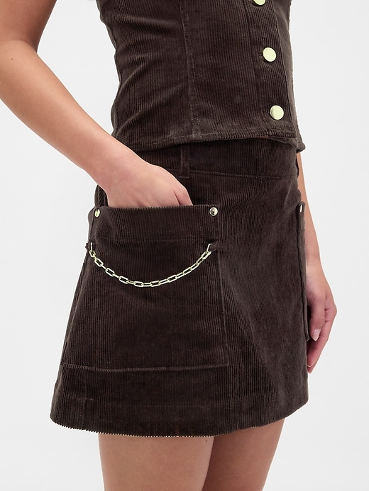 mini gonna-pantalone con tasca a catena in velluto a coste