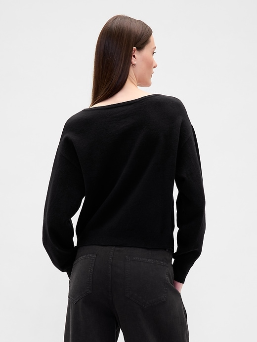 maglione corto elasticizzato con maniche a lanterna cashsoft