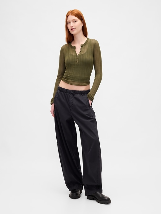 maglione henley a coste trasparenti