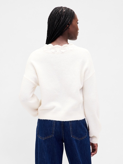 cardigan corto smerlato traforato e sfocato