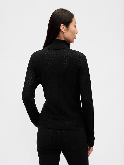 maglione dolcevita traforato