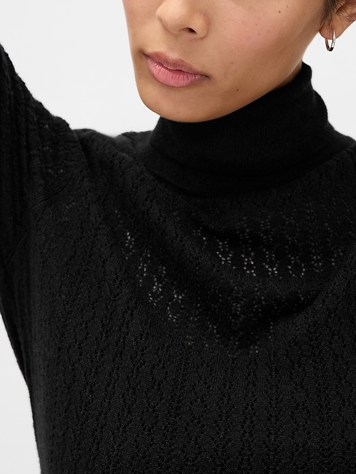 maglione dolcevita traforato