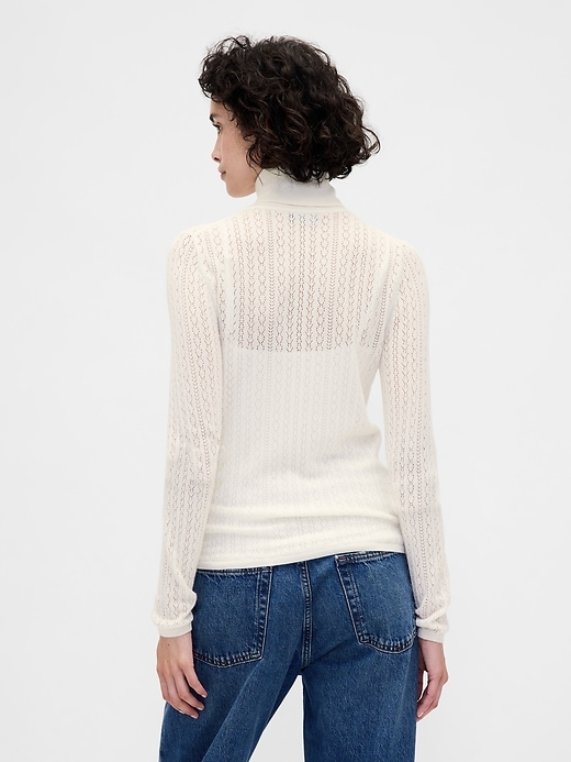 maglione dolcevita traforato