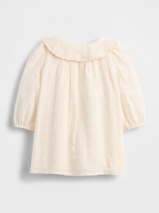 vestito ricamato per neonato