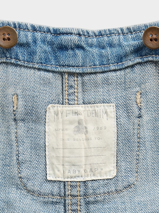 salopette di jeans per neonati
