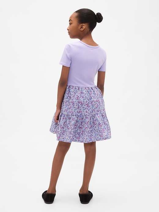 abito con balze in tecnica mista per bambini