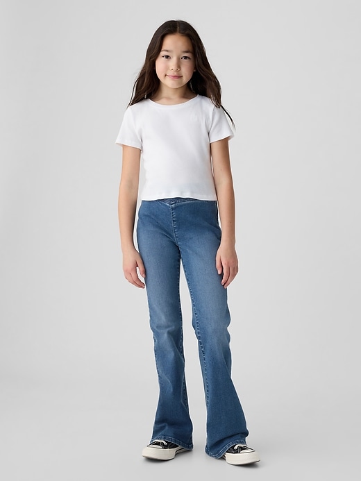jeans a zampa incrociati a vita alta per bambini
