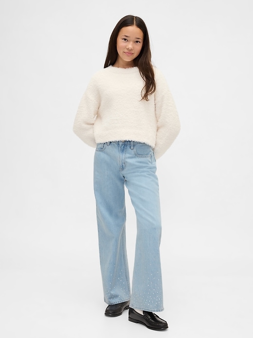 jeans a gamba larga con strass e vita bassa per bambini