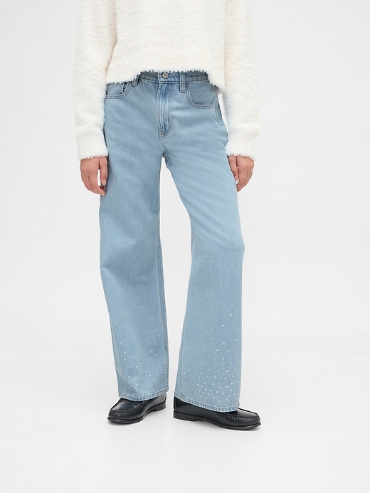 jeans a gamba larga con strass e vita bassa per bambini
