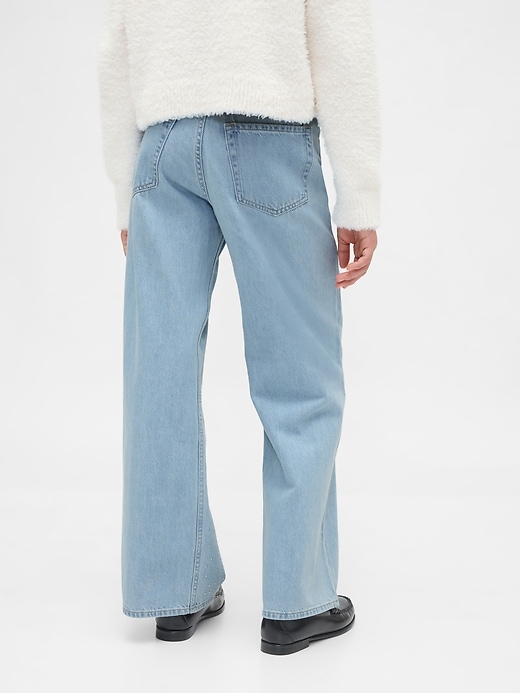 jeans a gamba larga con strass e vita bassa per bambini