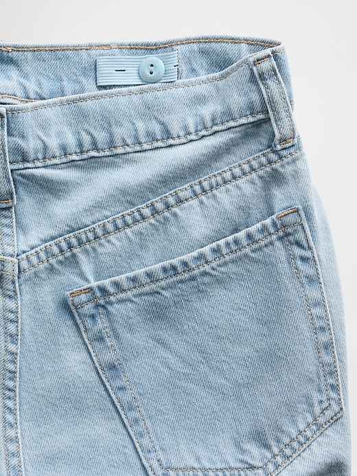 jeans a gamba larga con strass e vita bassa per bambini