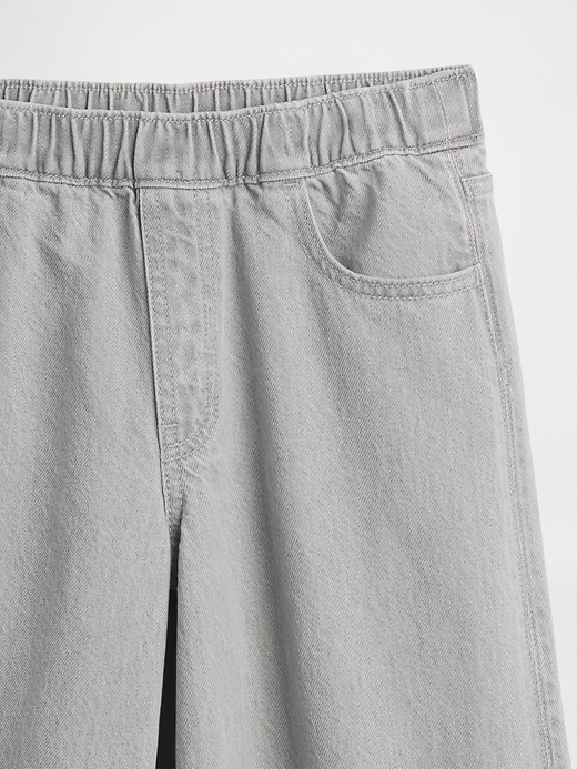 jeans larghi con orlo diviso e fiocco a vita bassa per bambini