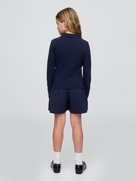gonna-pantalone plissettata cachi per bambini modello uniforme