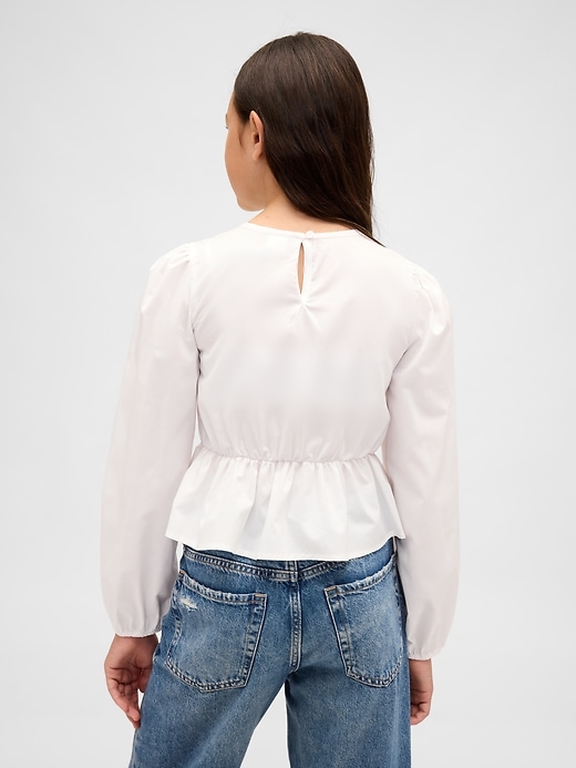 top peplo arricciato per bambini
