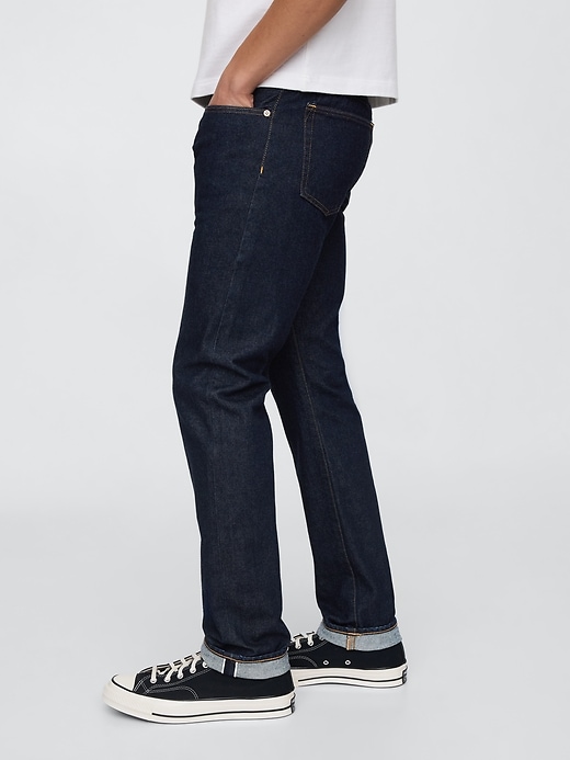jeans slim con cimosa